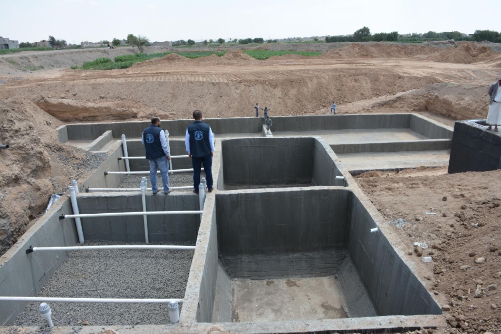 FAO staff visiting the water treatment plant under construction