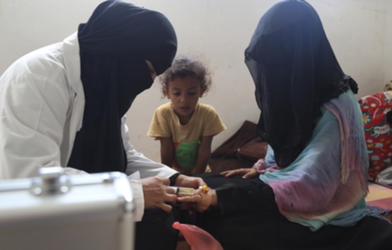 Sahar during a visit to provide services to women in a nearby IDP camp