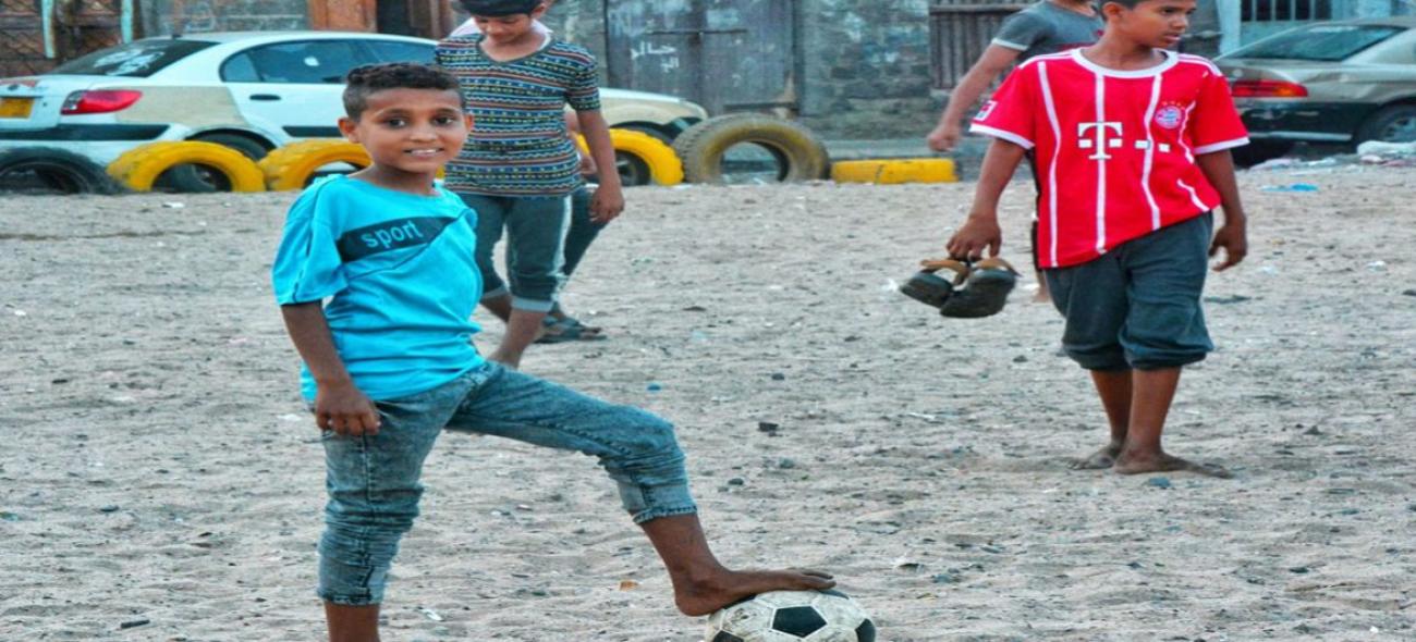 The youth of Al-Kharabah neighborhood in the football field