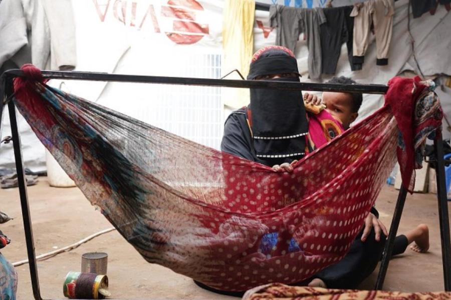 Attikah with her six-month-old baby boy