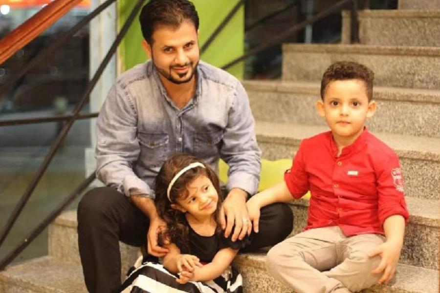 Dr. Wail with his two children, Tariq, 7 years old and Reem, 6 years old