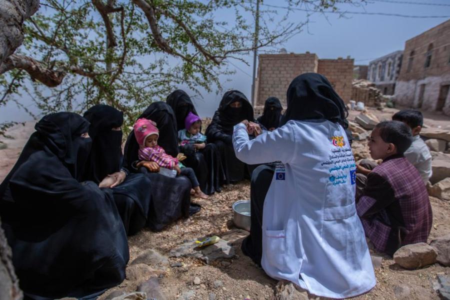 Ibtisam educating women of the nearby villages on hygiene and sanitation practices.